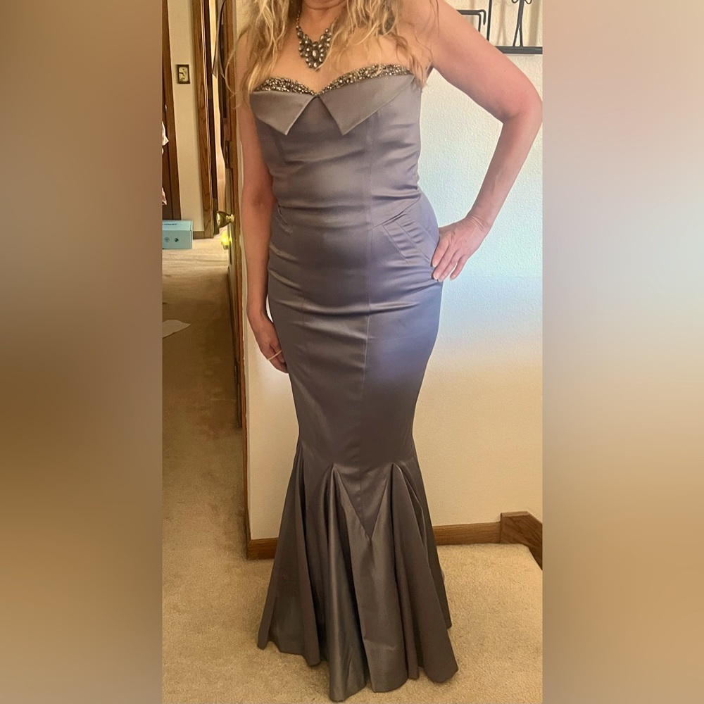 Beautiful gray satiny full-length mermaid-style gown.
